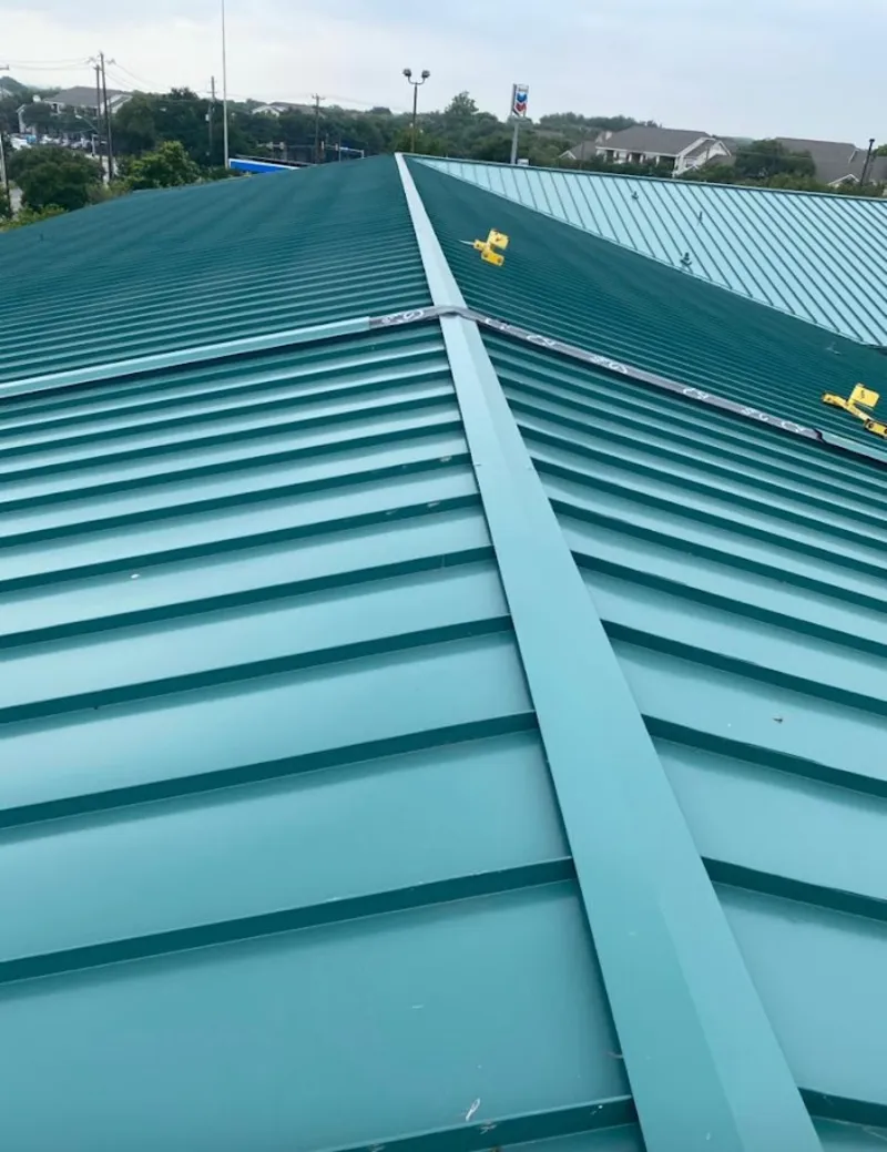 Green commercial metal roof ridge and valley for Metal Roof Repair in Bloomsburg